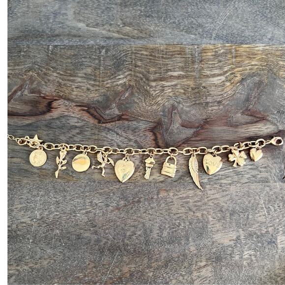 Gold tone charm adjustable charm bracelet- feather, lock, heart, star, moon - Picture 8 of 9